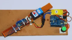Electronic engineering project with spinning LED array creating visual text through POV phenomenon