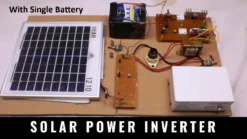 Solar inverter system model displaying 12V DC to AC conversion using MOSFET transistors and 4047 IC circuit.